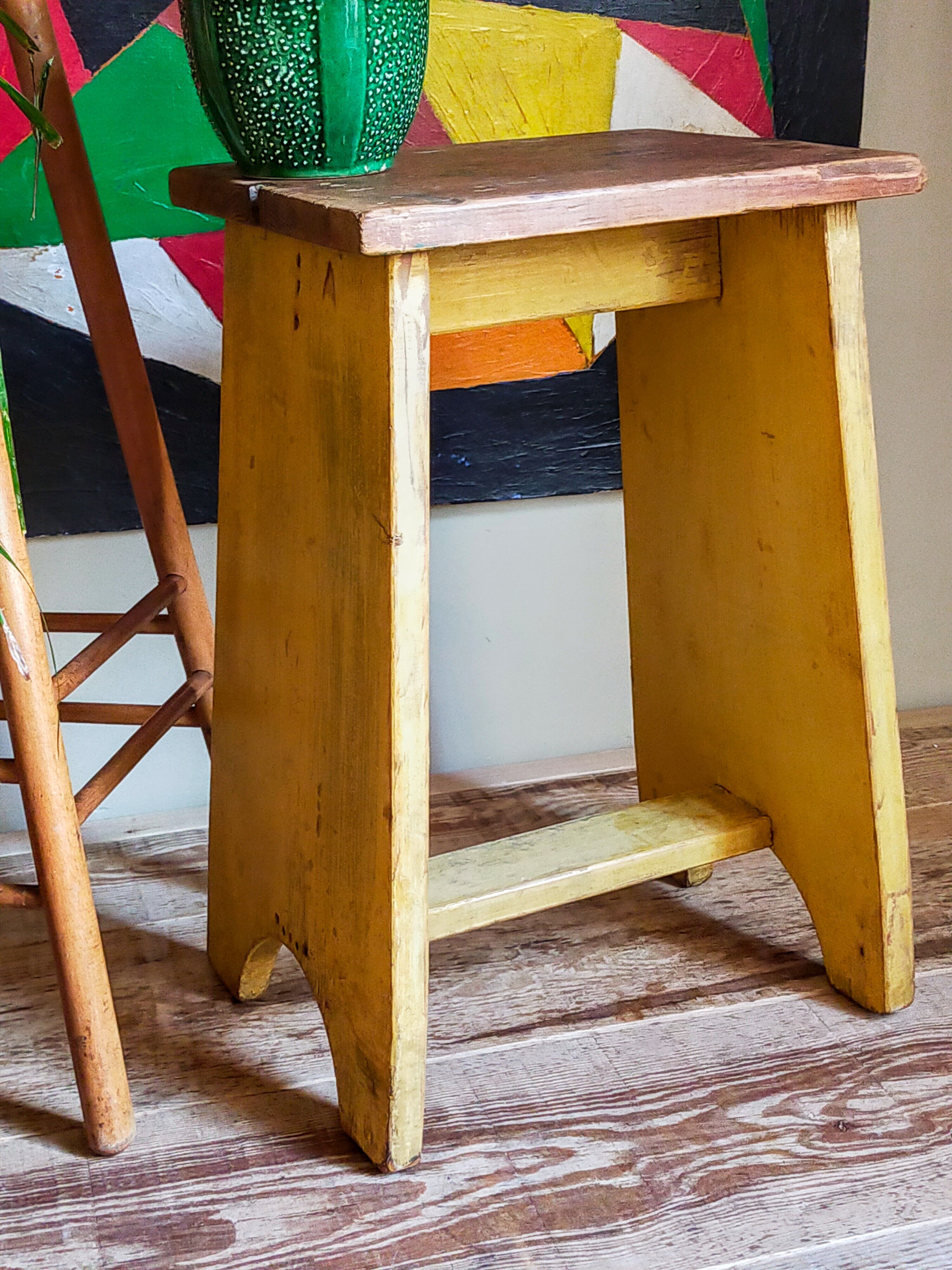 Art-populaire workshop stool in patinated painted wood