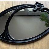 Miroir ovale en fonte d’acier décor art nouveau