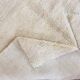 Tapis artisanal en laine naturelle
