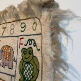 Vintage alphabet wall rug