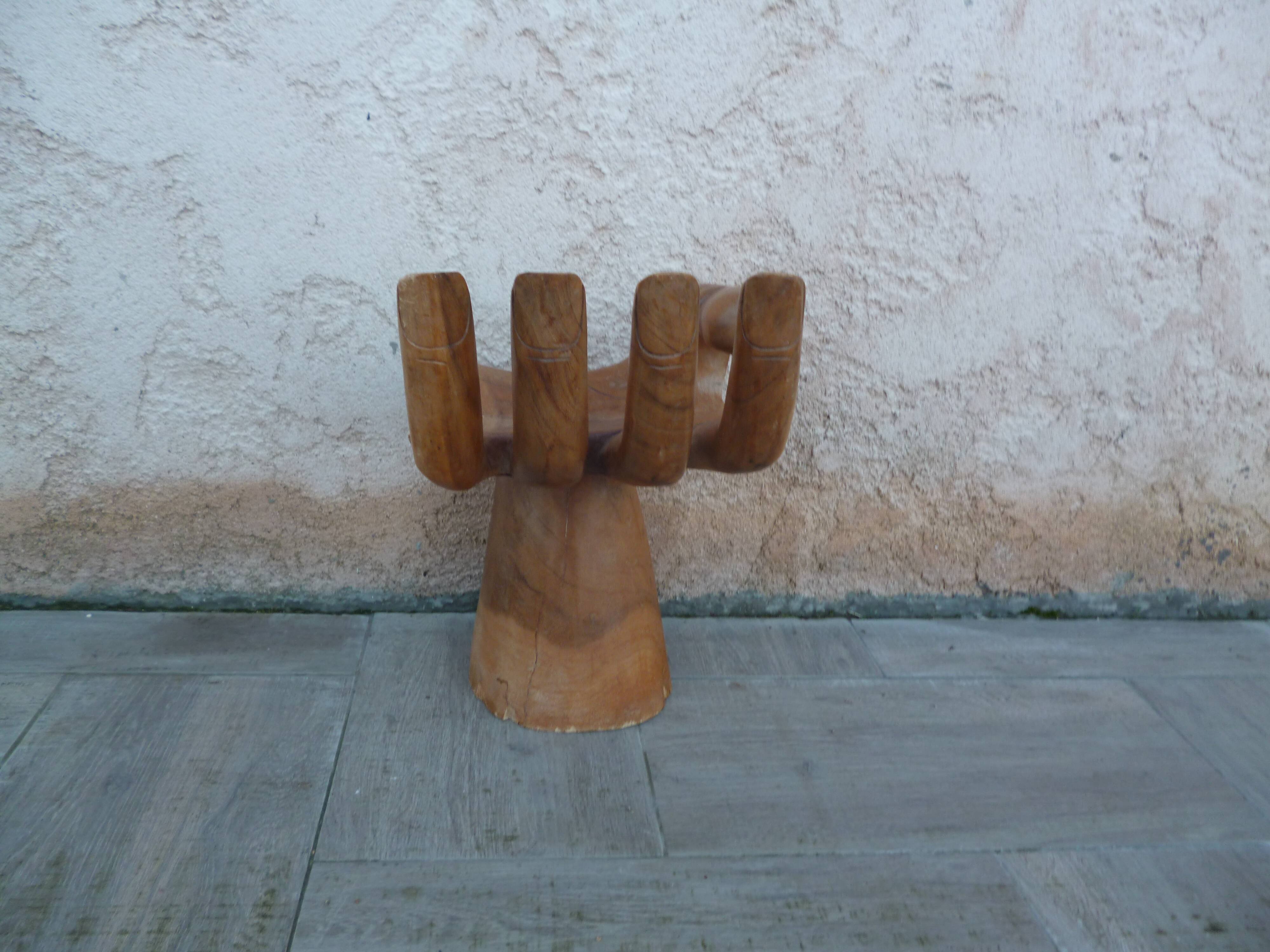Vintage wooden hand-shaped chair