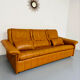 Ancien Canapé 3 places De Sede en cuir épais cognac design années 70