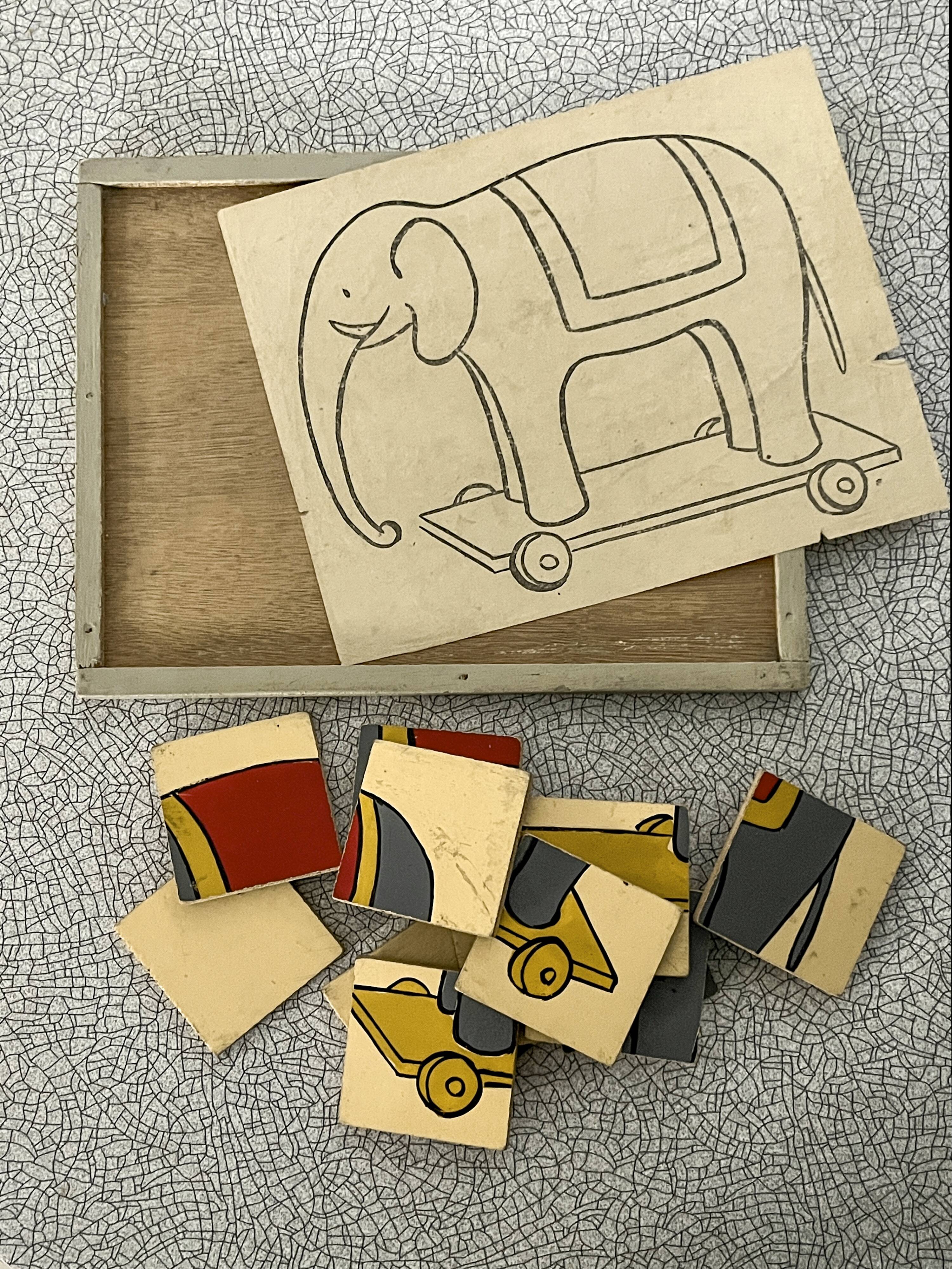 Wooden puzzle frame from the 1930s/40s depicting a circus elephant
