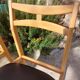 5 Scandinavian style chairs, wood and black faux leather.