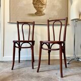 2 bistro chairs in arched and dark wood