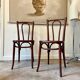 2 bistro chairs in arched and dark wood