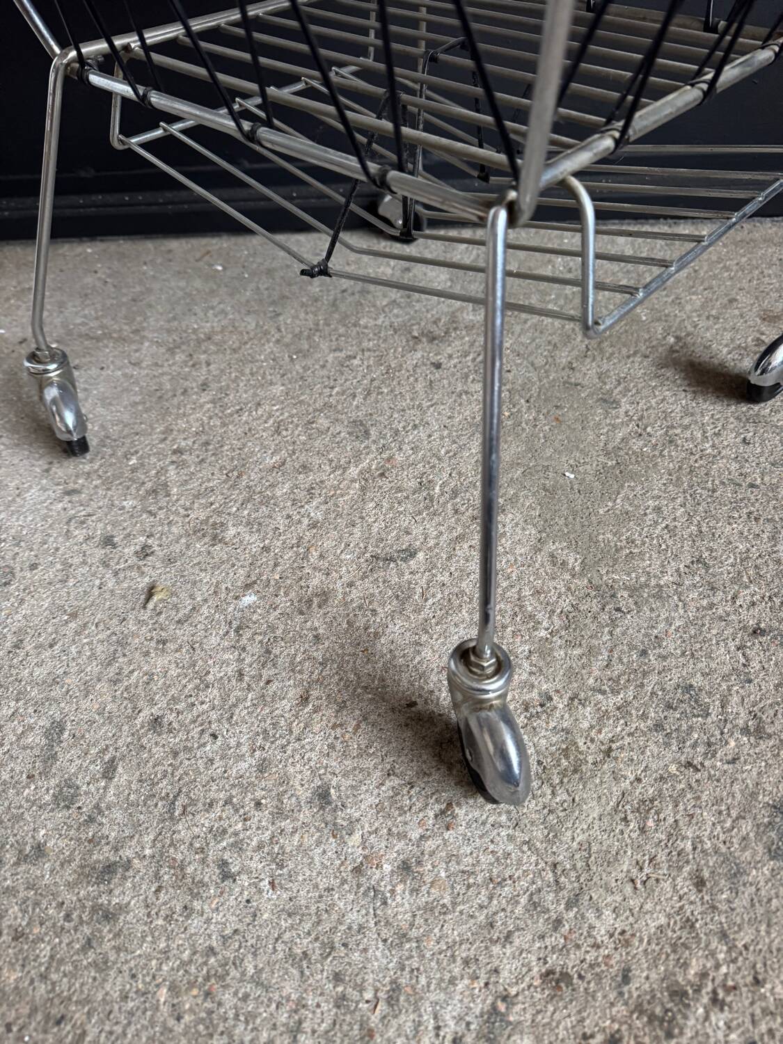 1950s rolling magazine rack