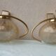 Pair of brass and glass wall lights