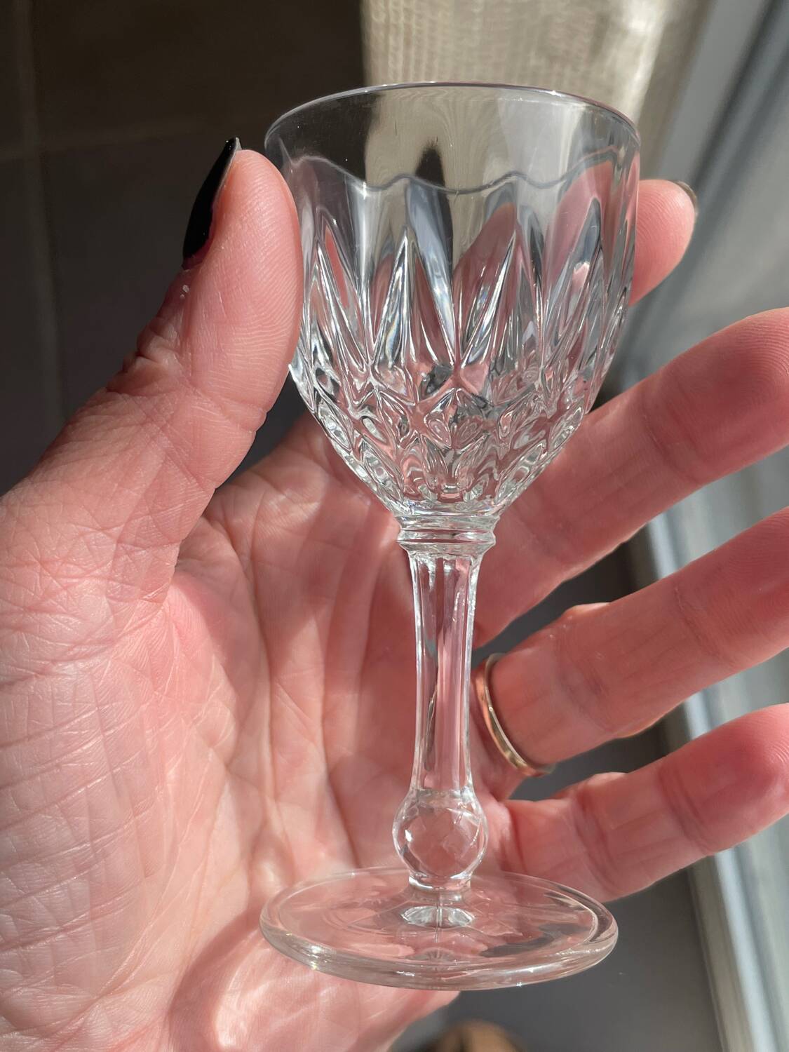 4 cut glass liqueur glasses on stems