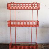 Vintage shelf in red openwork metal