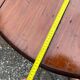 Antique round mahogany table, turned and fluted legs