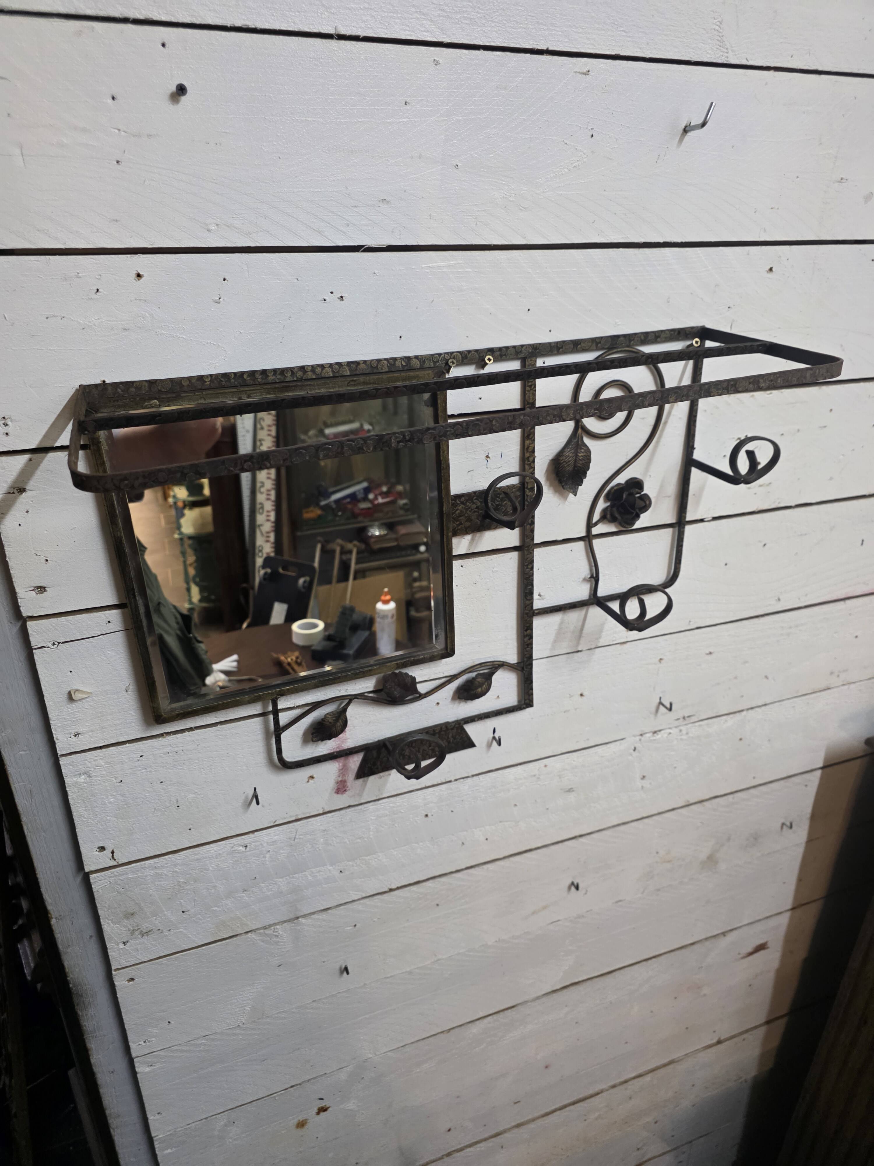 Art Deco coat rack in hammered wrought iron, 1950s.