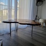 Tripod coffee table in natural solid elm magnifying glass