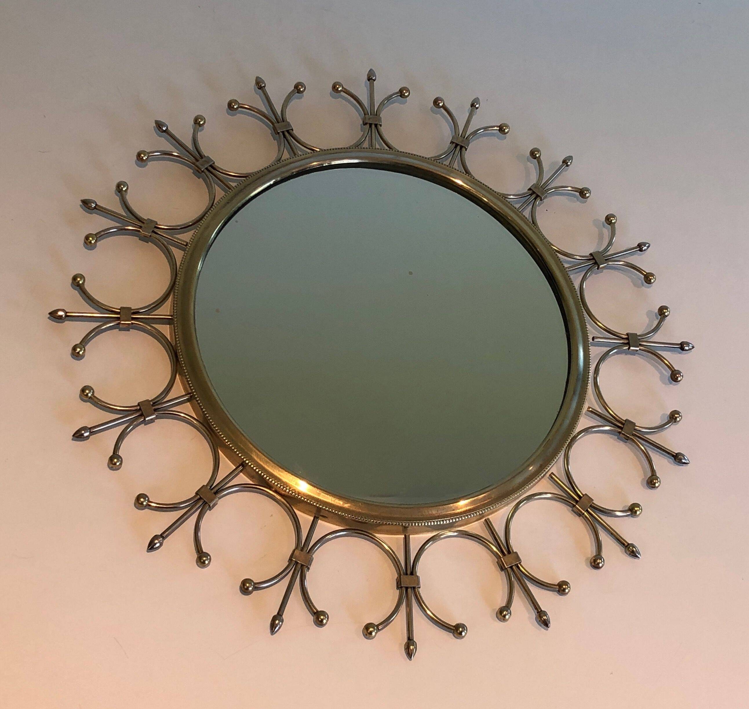 Sun mirror in brass and brushed steel