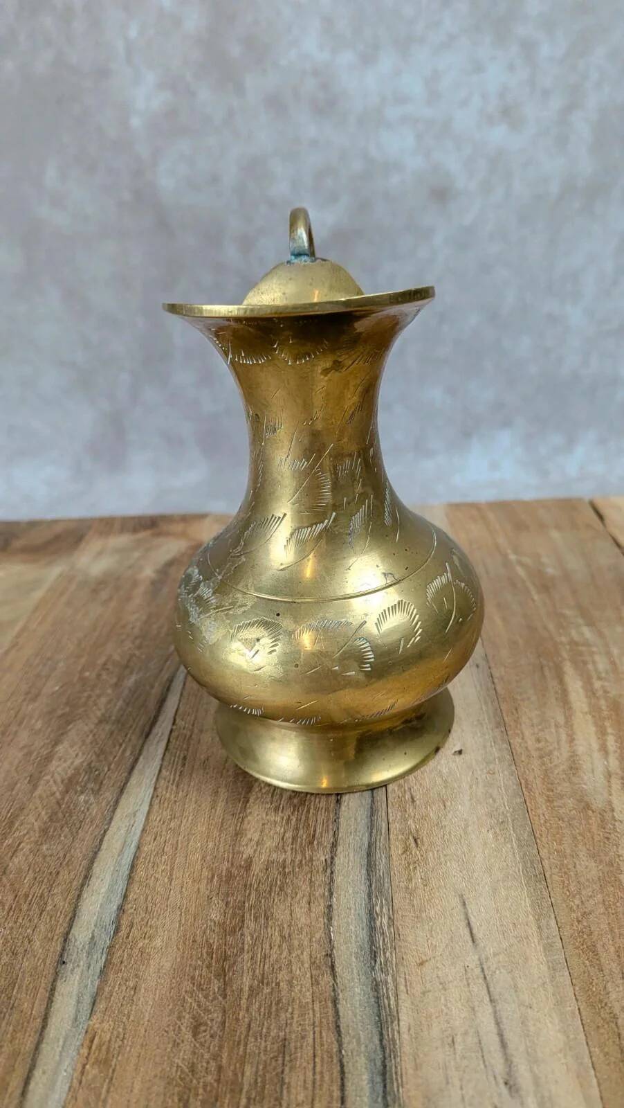 Small antique engraved brass jug