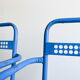 Pair of perforated metal garden chairs