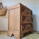 Art Deco chest of drawers in raw oak with carved drawers.