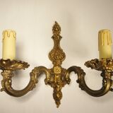 Pair of two-light wall lights in gilded bronze