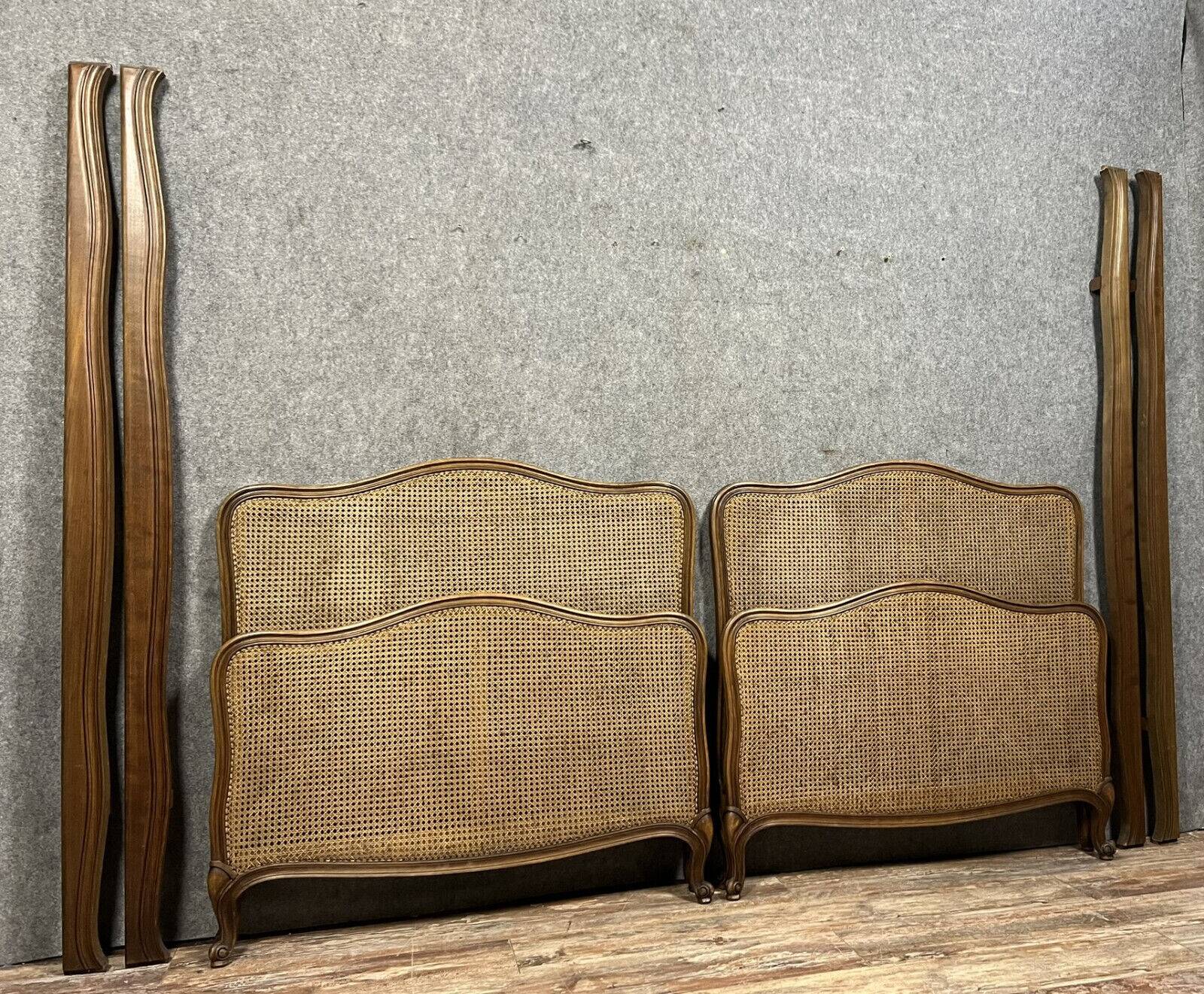 Pair of Louis XV style center beds in walnut and cane base circa 1900