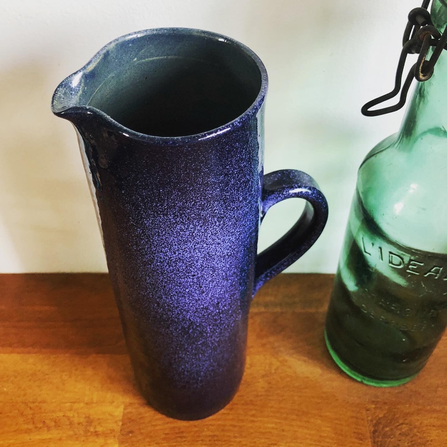 Blue enamelled sandstone pitcher