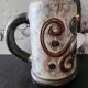Chopped stoneware mug signed Dubois, vintage ceramic engraved with spirals, height 17cm.
