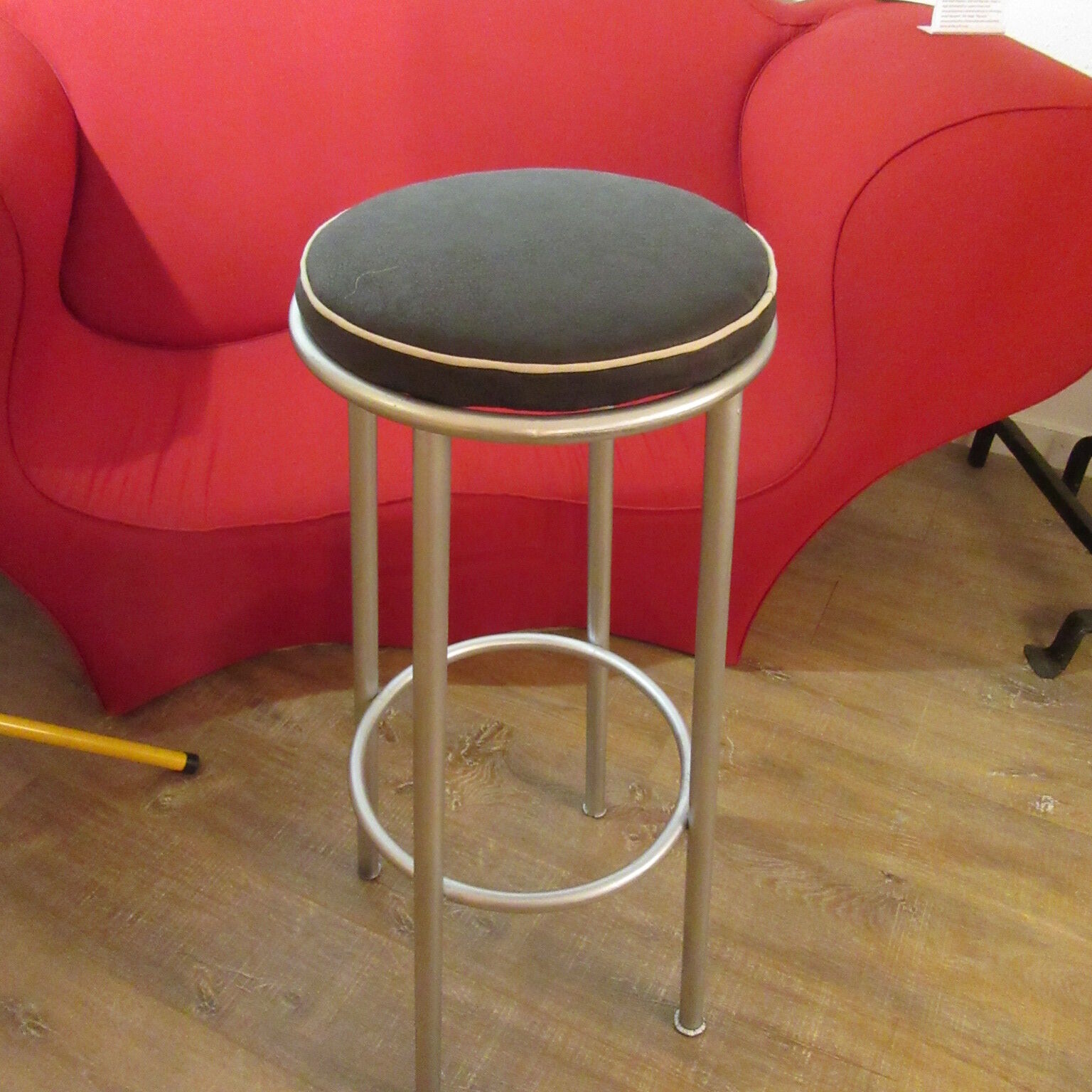 Iron bar stool and black skai seat