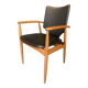 A Scandinavian teak skai chair from the 1960s for a vintage desk table.