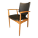 A Scandinavian teak skai chair from the 1960s for a vintage desk table.