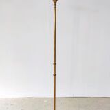 Halogen floor lamp in golden brass