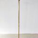 Halogen floor lamp in golden brass