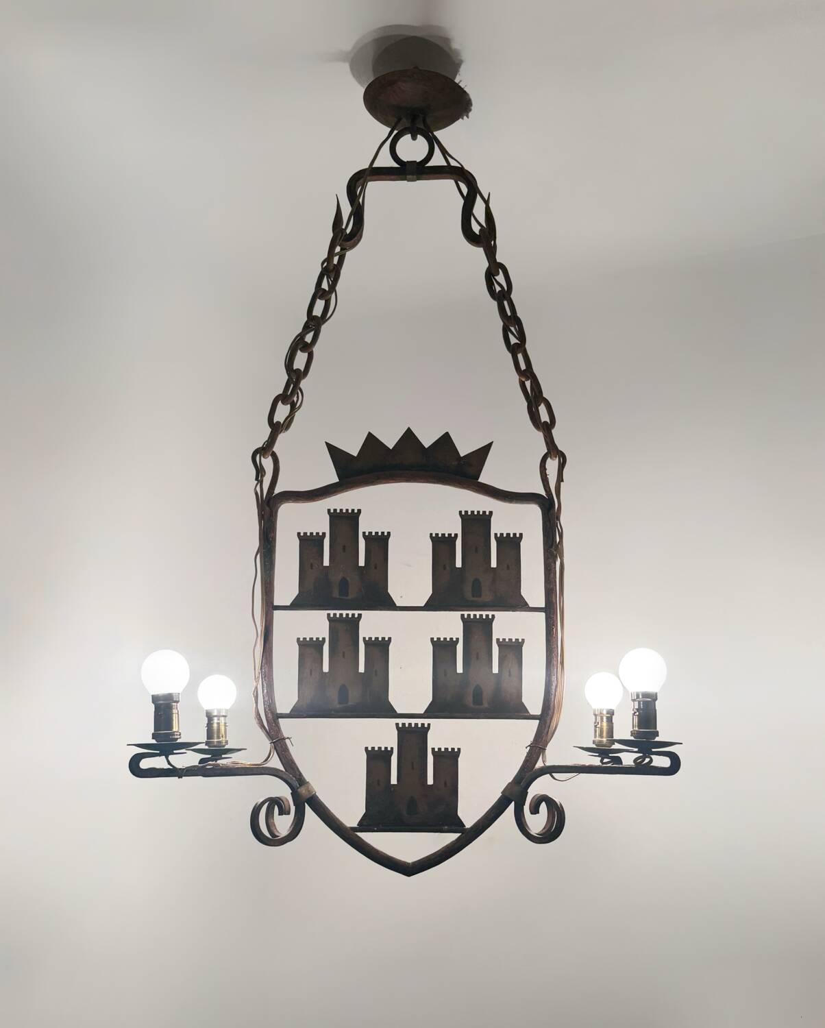 Medieval style heraldic wrought iron chandelier