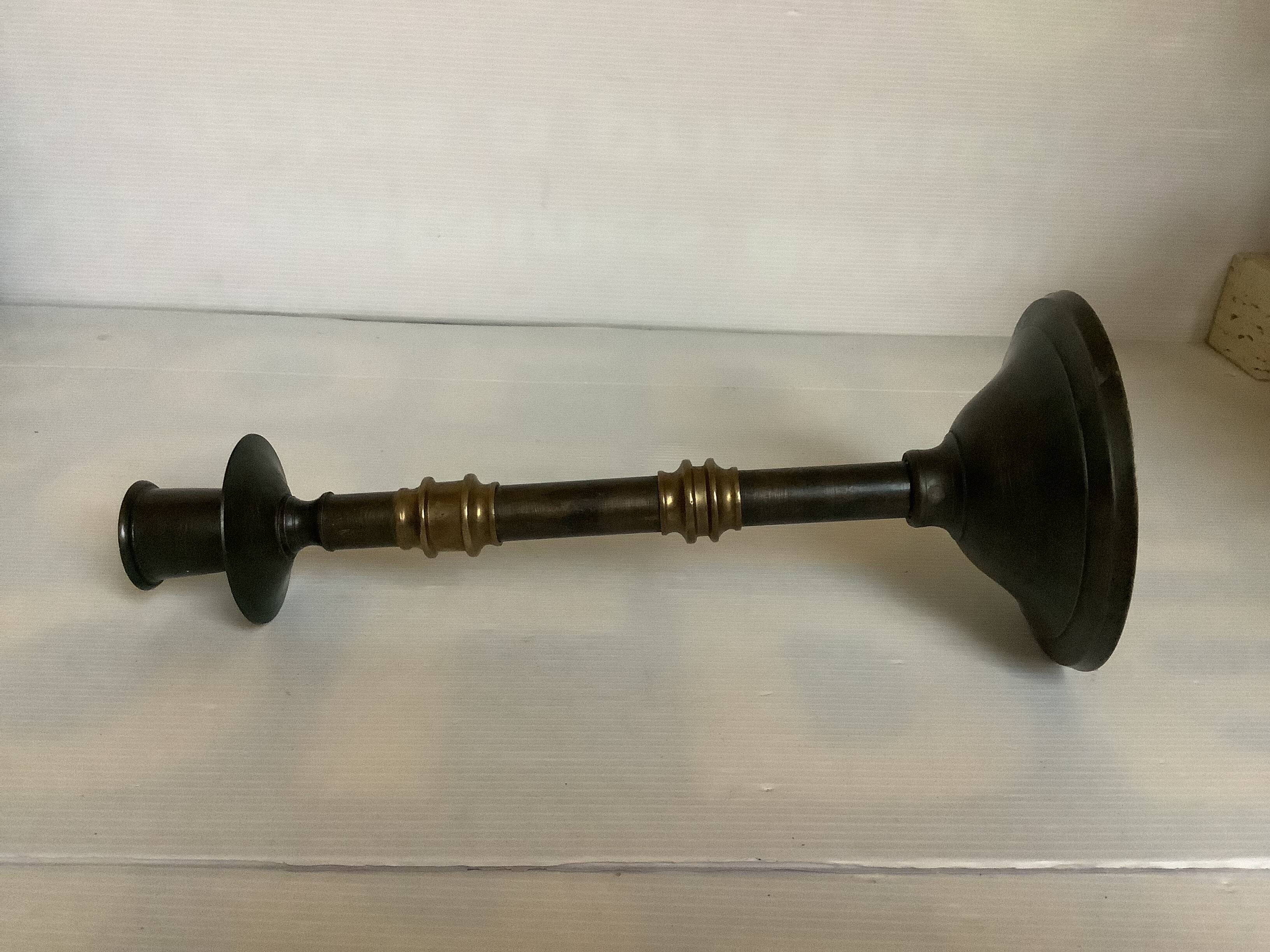 Large candlestick made of sheet metal and brass