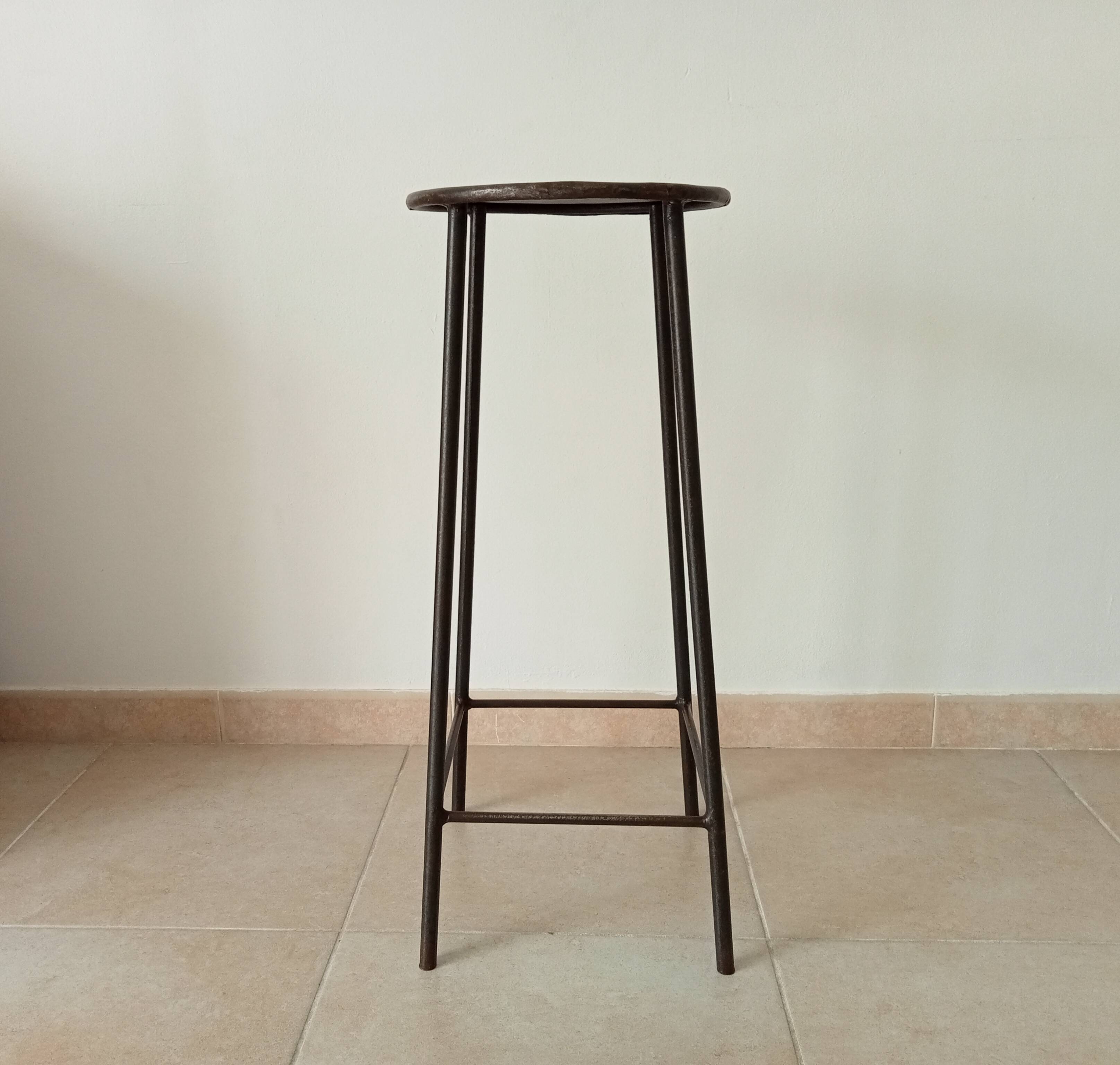 Brutalist high stool from the 1960s in solid steel.
