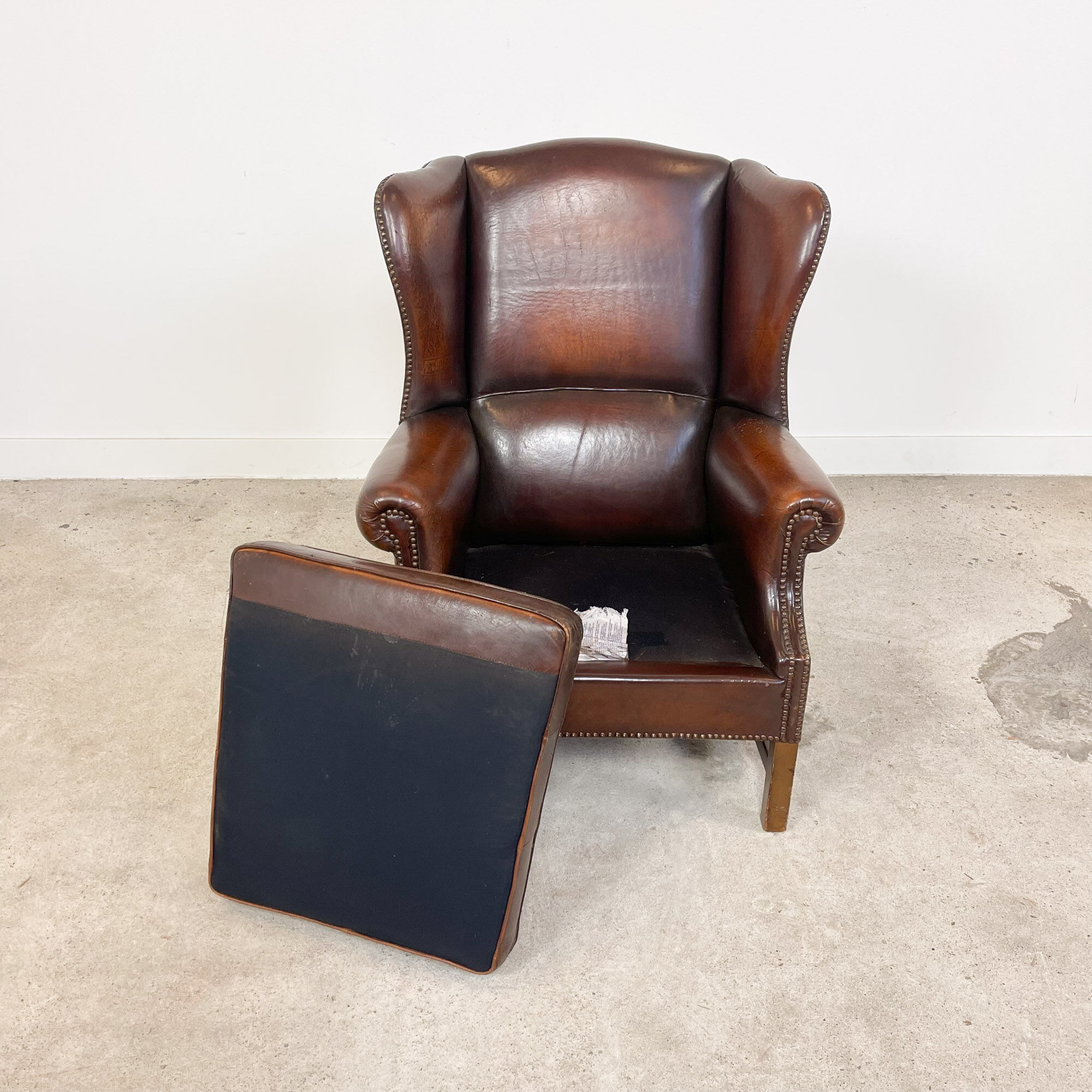 Vintage sheep leather wingback armchair london