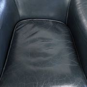 Set of dark blue cow leather club armchairs with a unique design
