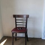 Set of 4 bistro chairs in curved wood and vintage red skai seats.