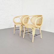 Paire de fauteuils en rotin et cannage