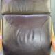 Chocolate leather armchair, wooden structure