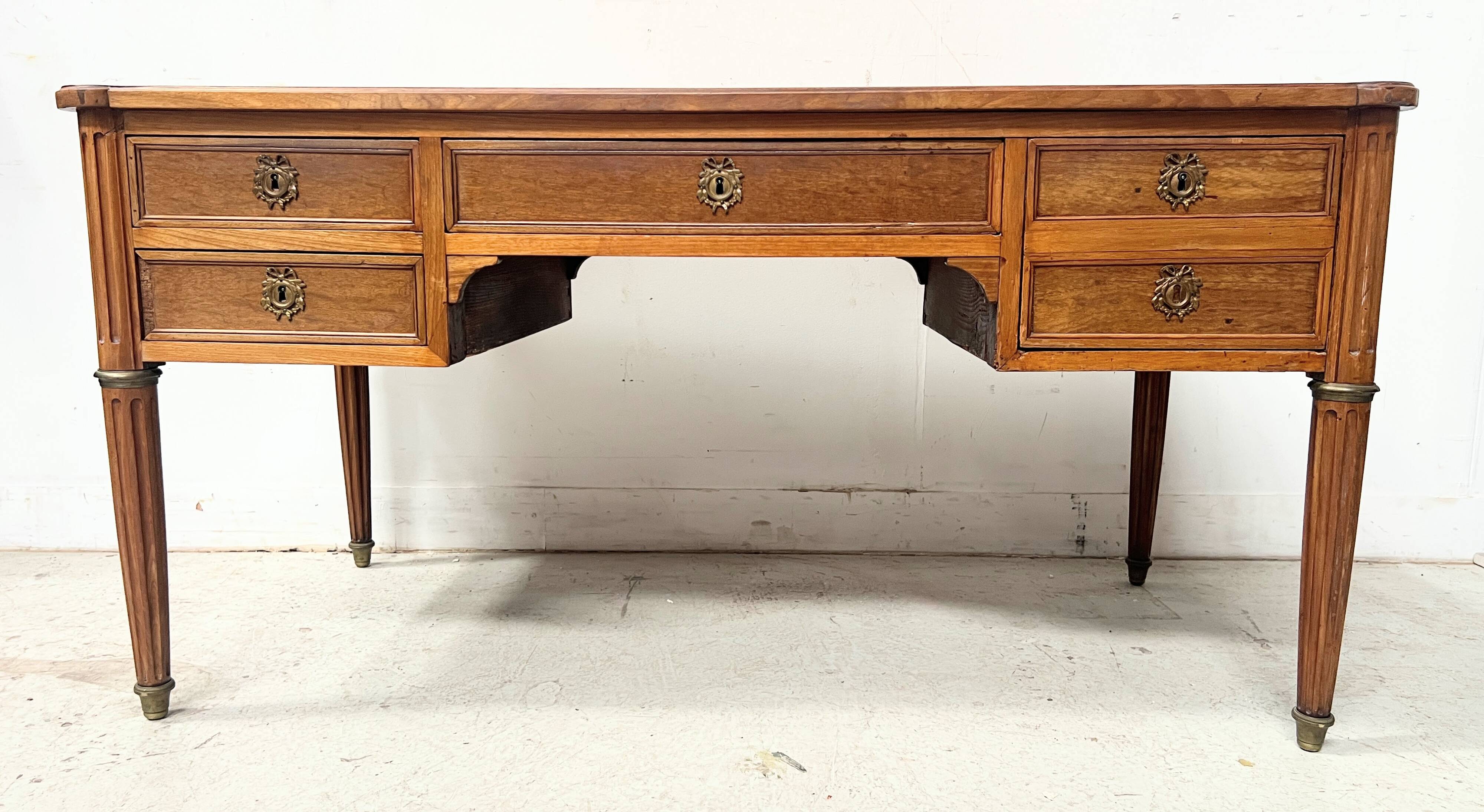 Louis XVI style walnut desk from the late 19th century.