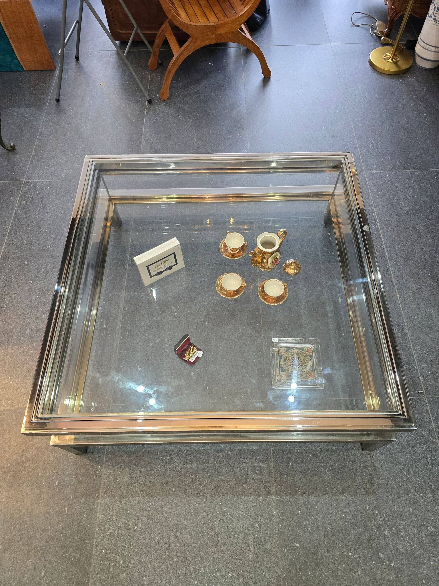Sliding top coffee table – 70s design – chrome & glass – 108 cm