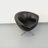 Vintage Scandinavian swivel chair in faux leather and chrome from the 1970s.