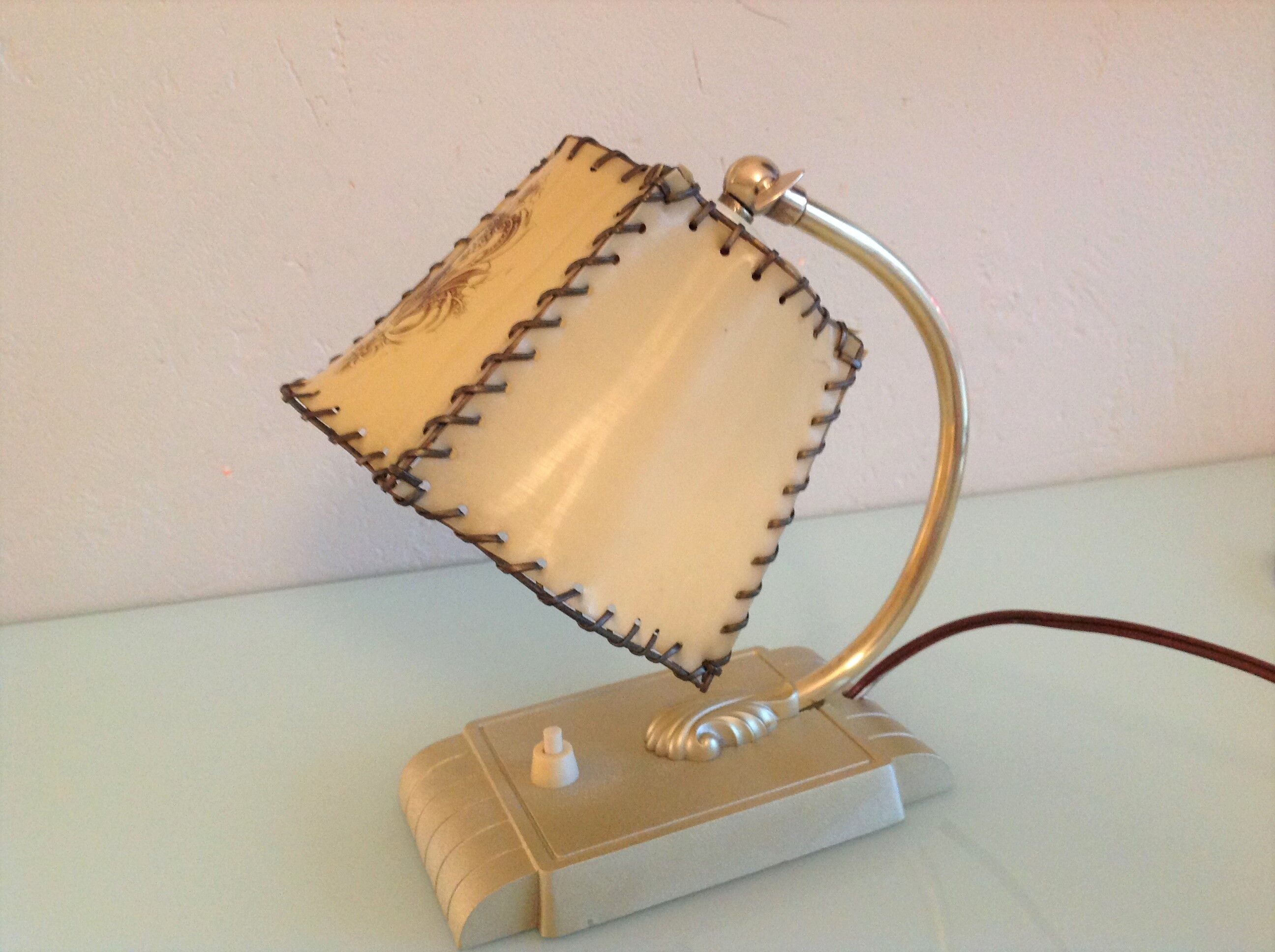 Brass bedside lamp and beige lampshade art deco style