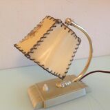 Brass bedside lamp and beige lampshade art deco style