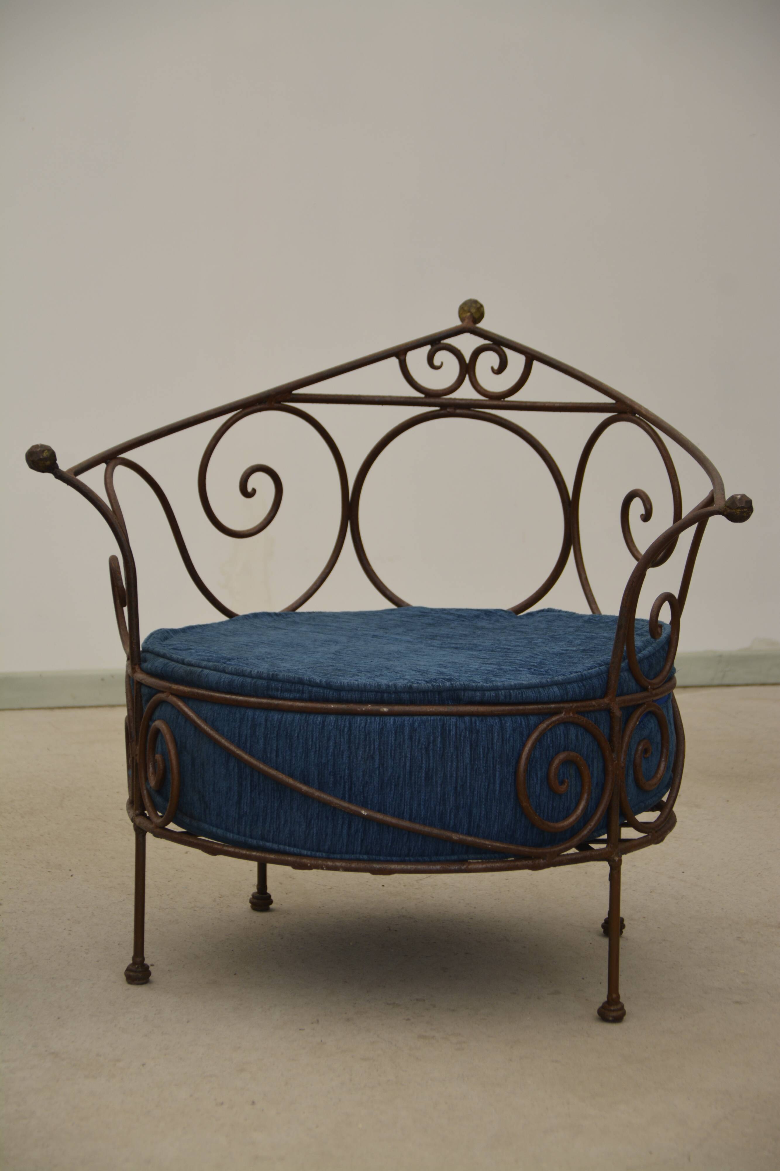Wrought iron armchairs