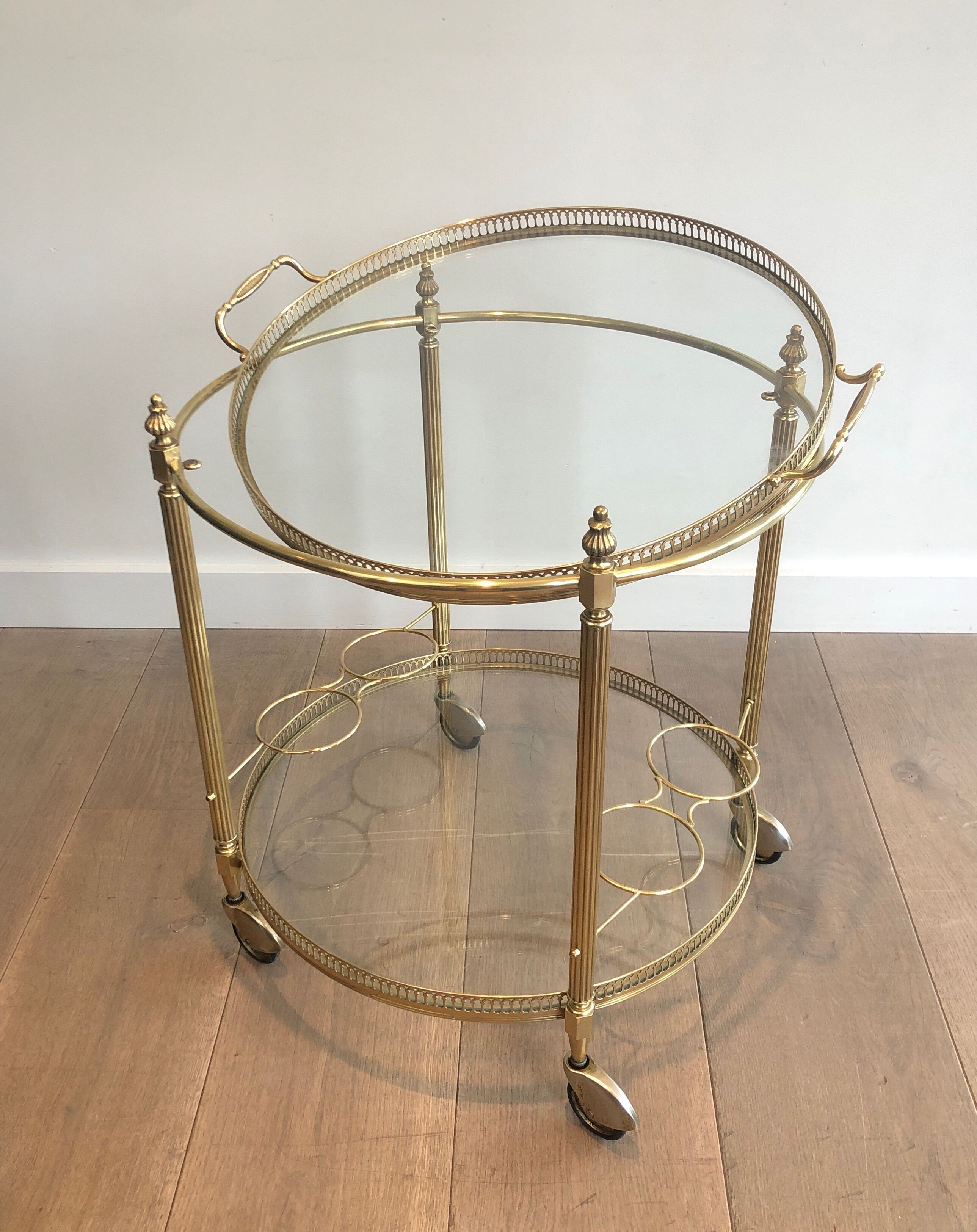 Neoclassical style rolling table in brass