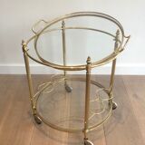 Neoclassical style rolling table in brass