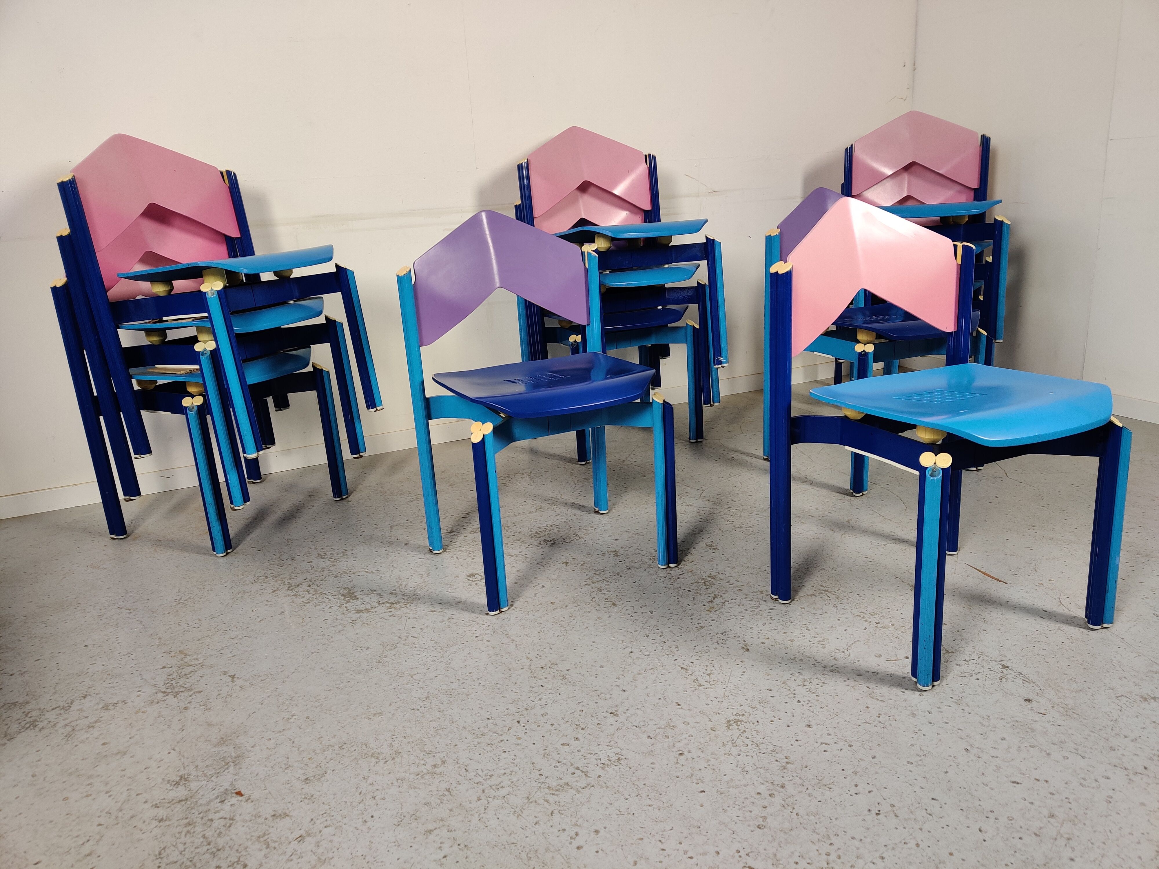 12 multicolored chairs wood and metal, 80s