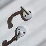 Antique enamelled cast iron wall hook from the 30s/40s