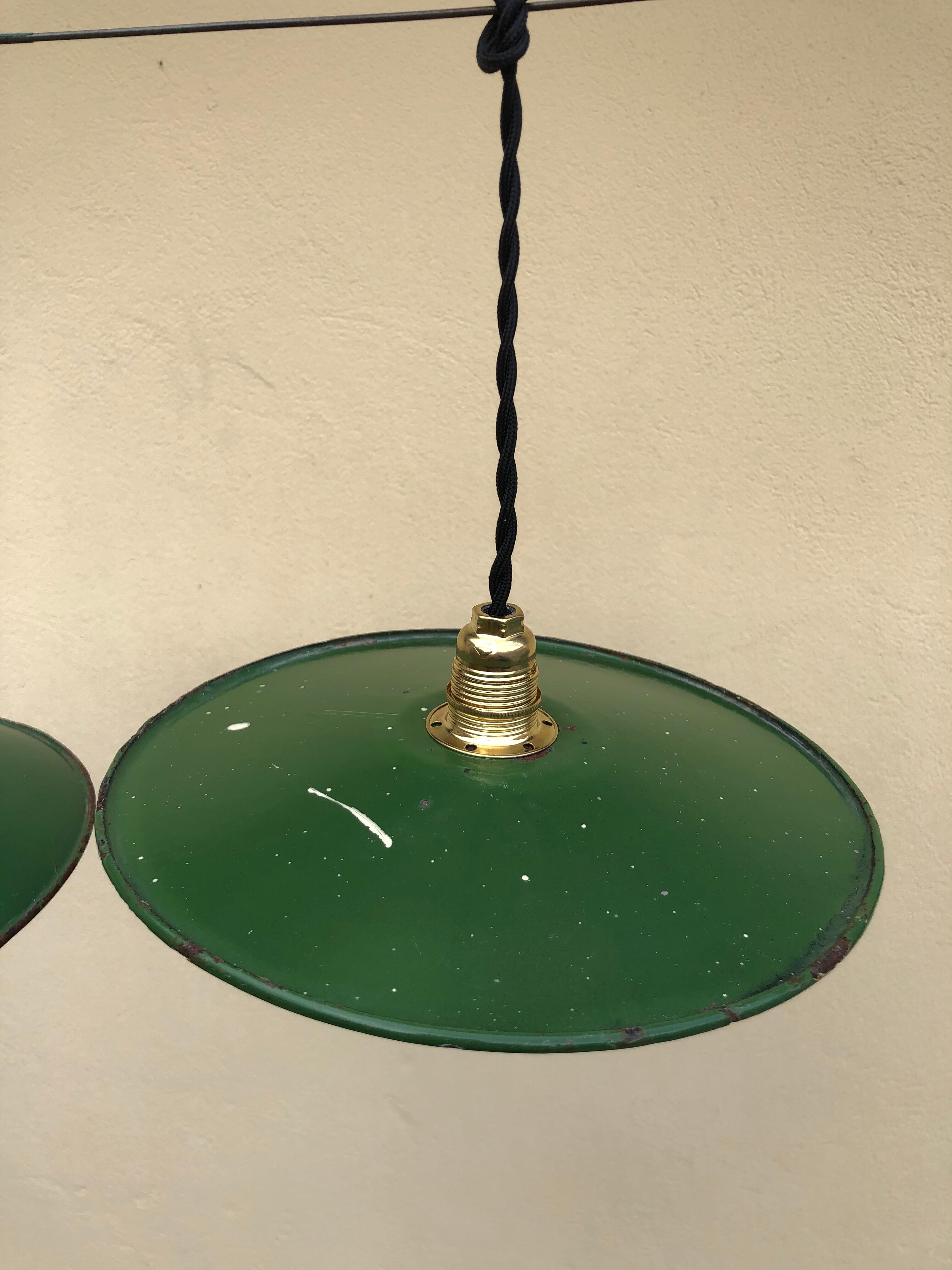 Trio in white green enamelled sheet hanging lamps