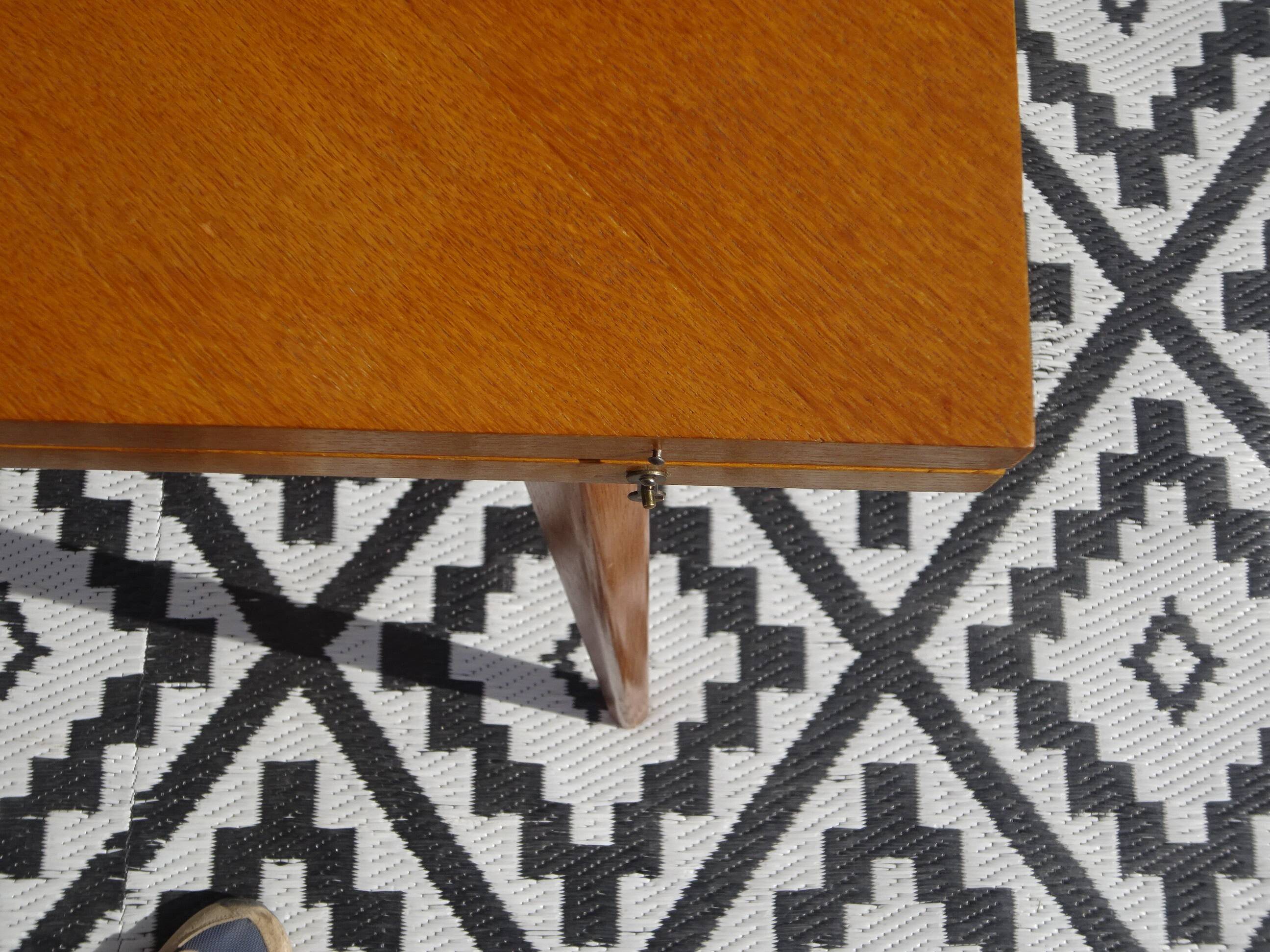 Scandinavian portfolio table model "half-century" by SAM